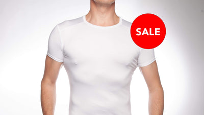 Man wearing white crew neck undershirt - a SALE sticker is positioned in the top right hand corner of the picture